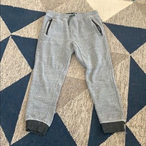 Gray joggers with zipper pockets